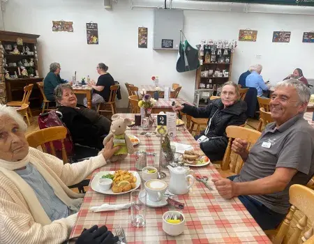 Here is a picture of our lovely ladies and our bus driver Glenn enjoying a delicious lunch!