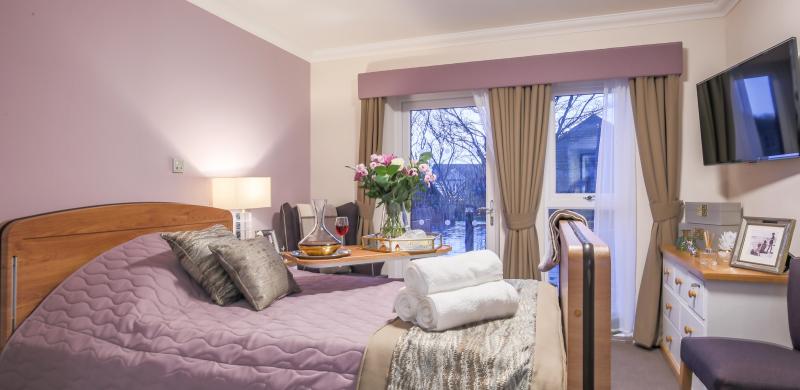 Bedroom at Queens Manor care home